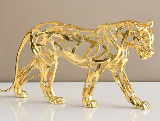 Prowl openwork alloy panther in warm gold tone, model 77304A