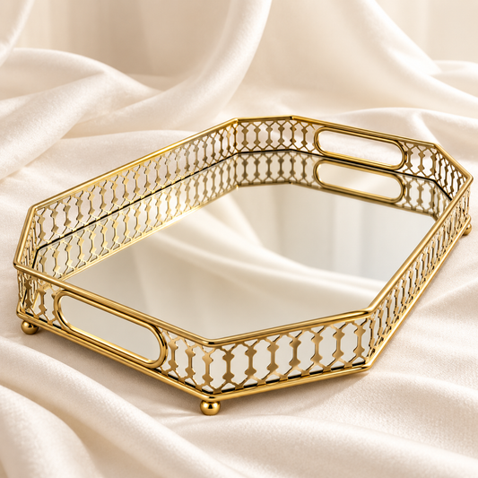 Octagon Mirror Tray with gilded lattice rim on ivory satin