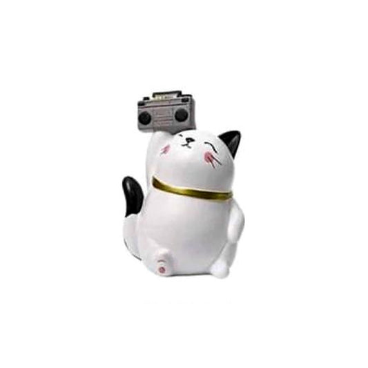 The Headliner: white Chubby Cat figurine with black ears, gold-tone collar and a miniature stereo raised overhead.