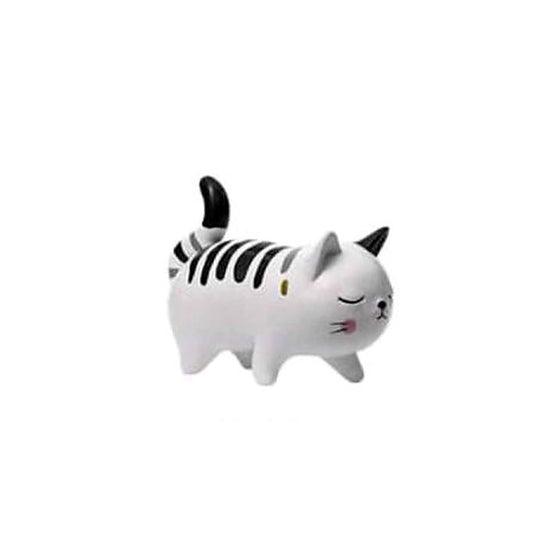 The Wanderer: walking white Chubby Cat figurine with black stripes across its back and a raised tail.