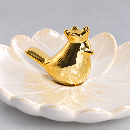Golden Bird Trinket Dish — close-up of gold bird and glossy porcelain