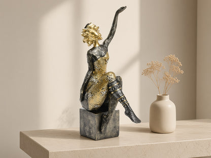 Gilt Sprig Lady, Arm Raised on a limestone console