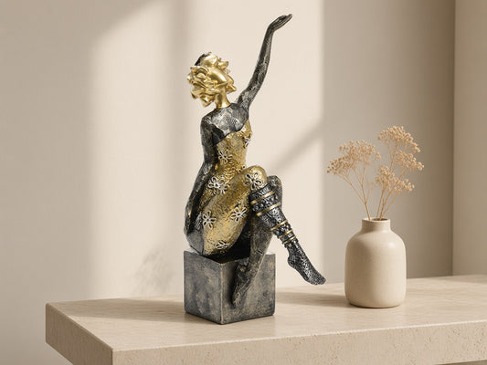 Gilt Sprig Lady, Arm Raised on a limestone console