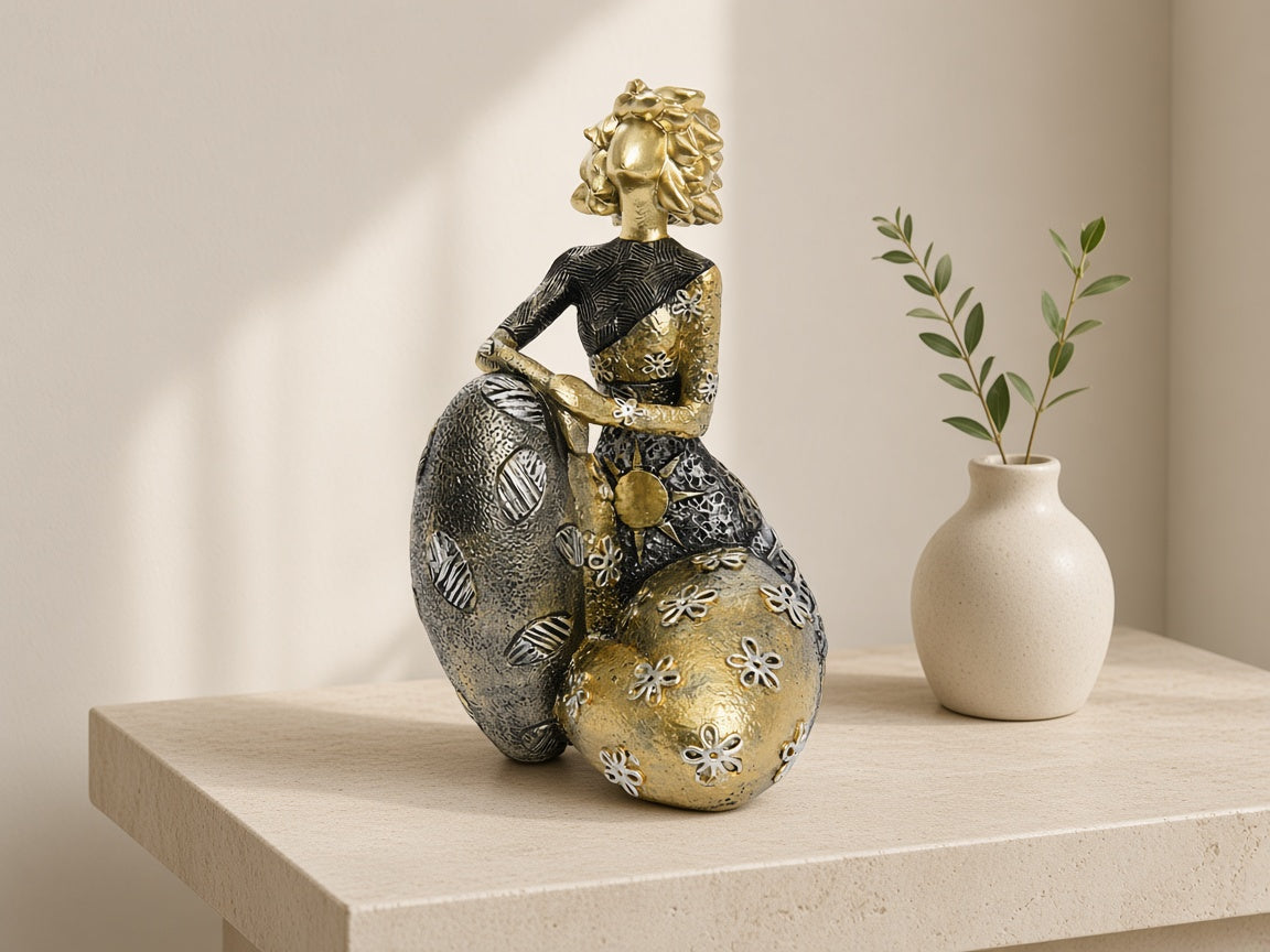 Gilt Sprig Lady on a Sphere on a limestone console