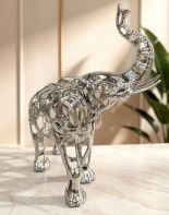 Regal openwork alloy elephant in silver chrome finish, model 21903
